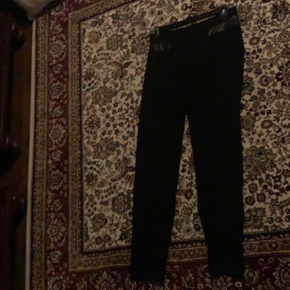 Black pants with leather accents